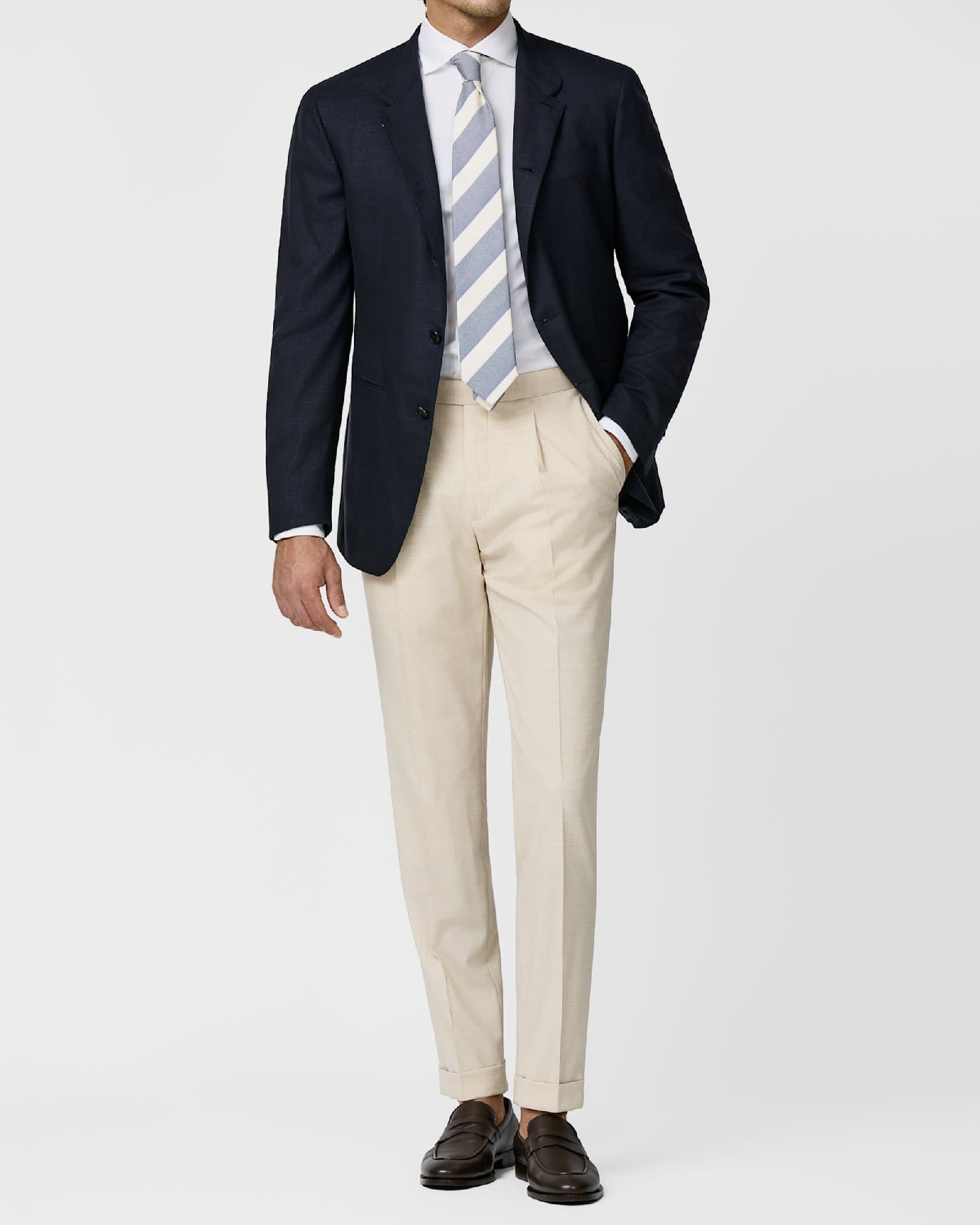 Navy Blazer with Cream Trousers and Striped Tie — image 1